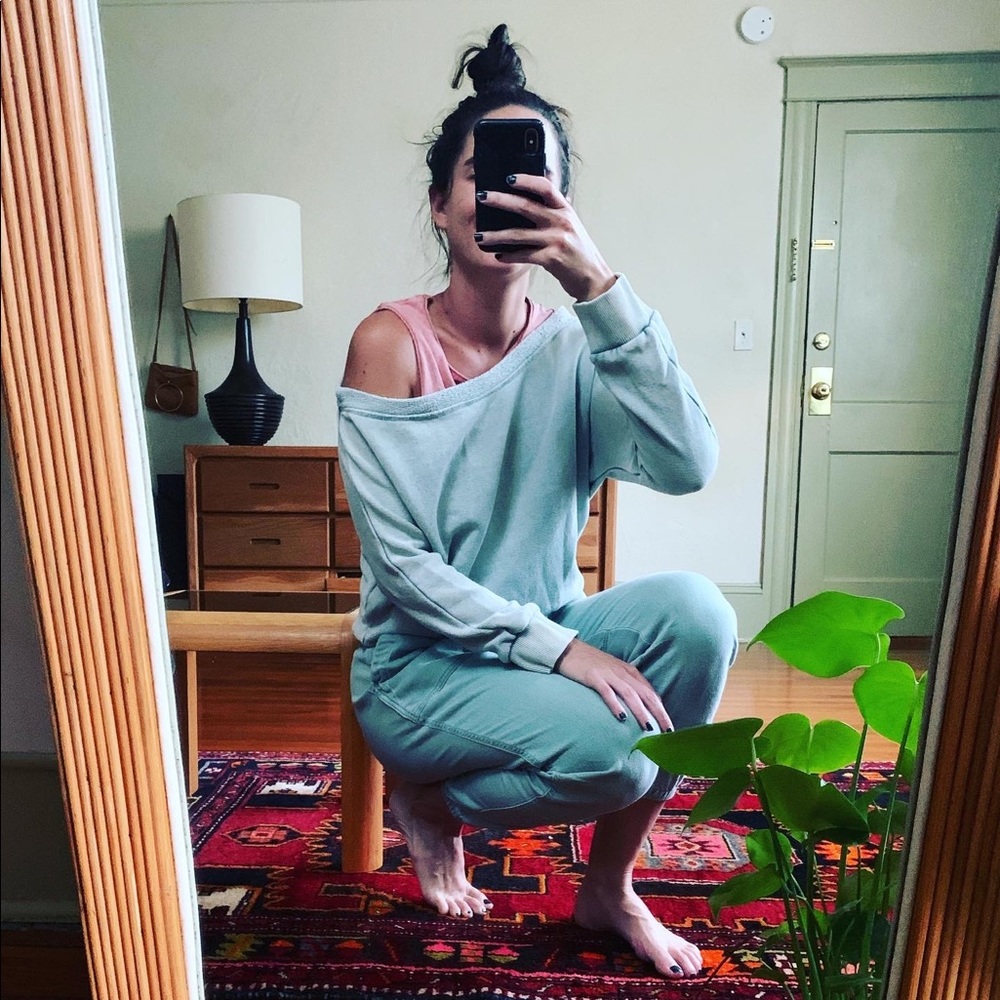 Green slouchy, off-the-shoulder sweater